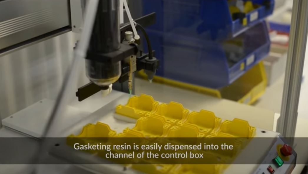 Dymax UV Curable Gasket Material Dispensed Into The Channel of a Control Box